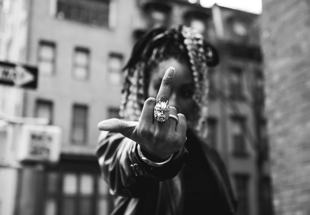 Photo by Brian Jr Asare: https://www.pexels.com/photo/grayscale-photo-of-a-person-doing-bad-hand-sign-13383309/